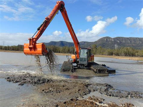 swamp tracks excavator|amphibious swamp tracks.